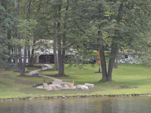 Lake Front w/ 1.5 Acre Private Lot, Hot Tub, Paddle Boat, & Kayaks