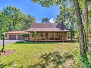 Riverfront Oconto Cabin with Fire Pit and Yard!