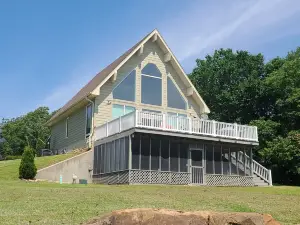 Gorgeous lake house with sandy beachfront. Welcome to Lost  World Landing