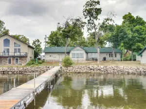 Lakefront Isle Escape w/ Dock + Fire Pit!