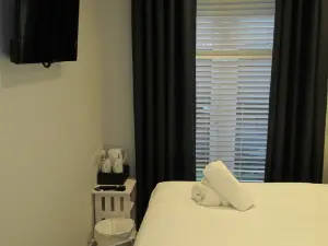 Rooms at the Ritz Complex