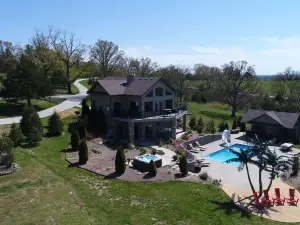 Scenic Lakeside Chateau with Heated Pool, Hot Tub & Outdoor Kitchen-TV-Fireplace