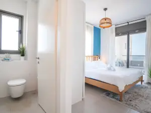 Stylish Seaside Escape with Balcony