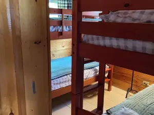 Cozy Adirondack cabin with private dock and kayaks, feet from Adirondack Lake