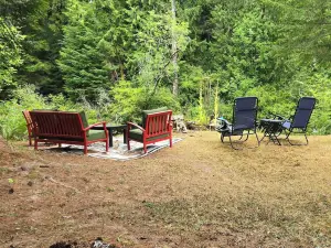 Fish, kayak or relax at a riverfront cabin in the woods of Rainier, Washington!