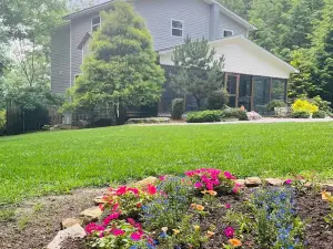 Stay on a Waterfall! 13 Acres, Huge Deck, Bluffs, and Views You’ll Never Forget!