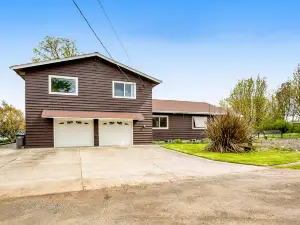 Soundfront home with WiFi, washer/dryer, central AC, and enclosed yard