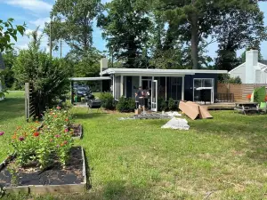 Mid-Century Rivah Retreat with Dock, Fire Pit & Cozy Fireplace