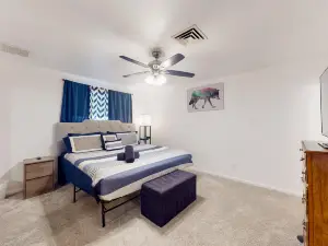 Spacious updated home in great location with enclosed backyard, patio, AC