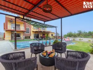 StayVista at Mangifera Agro Estate with Pool, Wi-Fi