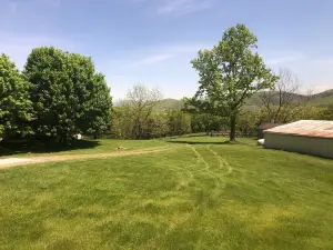 Enjoy this private mountain retreat with stunning views on 230 acres
