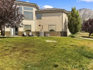 The Rec Room is a basement apartment with game tables, theater, hot tub & more!