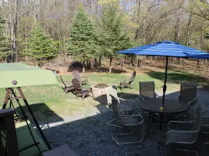 Cozy Pocono Home w/ Hot Tub, Sauna, Game Room, A/C, 65" TV, WIFI,