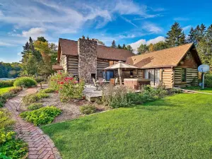 Log Cabin on the Wolf River w/ Private Hot Tub!
