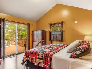 Lakefront dog-friendly gem with private dock, wood stove, large deck & free WiFi