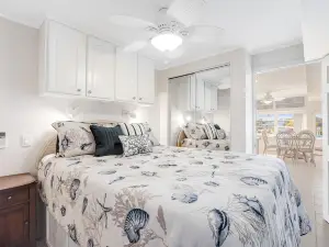 Canal-front home w/dock, resort-style amenities, patio, & high-speed WiFi