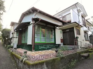 A Ghiblistyle House in Front of Gora Station Ide