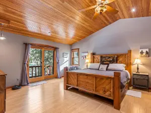 Expansive Riverfront Lodge with Dock, Game Room, Bar, & Spacious Deck