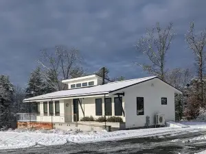 Contemporary house on 8 acres of wild flowers, trees and trails; pet friendly