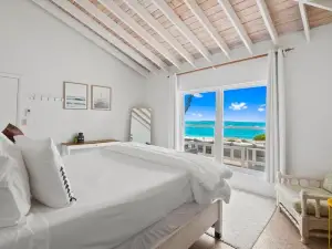 Beachfront White Palm Villa - Tar Bay