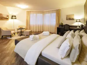 Business Hotel First