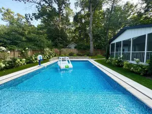 Beautiful 4 bdrm/3 ba, finished lower level, screen porch, heated pool, fire pit