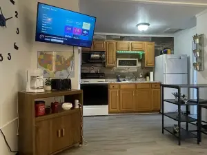 "Prime Location Stylish 1Bedroom  with Hot Tub Access, across street from Legion