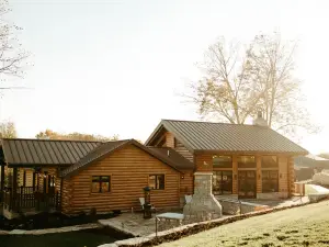 A peaceful cabin in the middle of a country setting