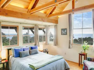 Unique coastal retreat boasting ocean views, spacious deck, lofted layout & WiFi