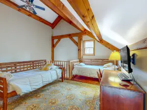 Spectacular lakefront home with dock, firepit, & vaulted ceilings - dog-friendly