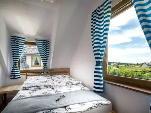 Domki Łeba, Apartamenty Łeba - Polanki23 - Basen, Sauna, Kino