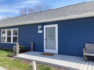 Large family cottage steps from waters edge