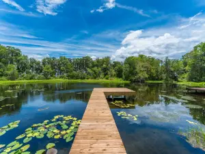 Tranquil Getaway with Boat Docks and Wraparound Deck - Charming Retreat