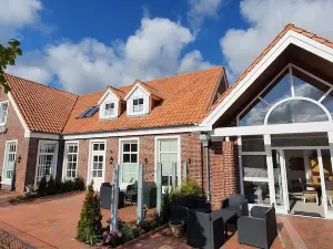 Friesischer Hof, Ferienwohnungen Mit Indoor Spielplatz, Kostenfreien Parkplatz Und W-Lan