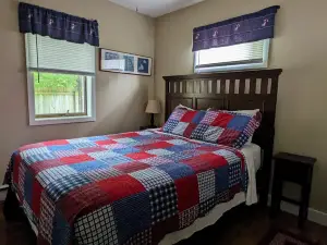 Enclosed Porch and Shared Waterfront Access - Charming Cottage Retreat