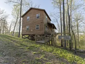 Pet-Friendly Peaceful Cabin Near River w/ Fire Pit + Hot Tub Sleeps 10