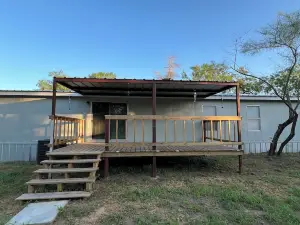 Charming 3-bedroom house with AC and WiFi in welcoming Lytle,TX.