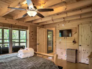 Spacious Cabin with Game Room and Hot Tub - Charming Retreat