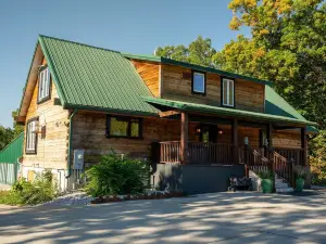 Majestic log home on 20 private acres near ski resort w/pool & hot tub