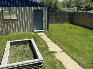 Cozy home with fenced yard and pet friendly.