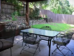 5 bedroom 3 bath hot tub. 7 beds 6 cars parking and fenced yard .