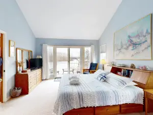 Lakefront retreat with views, hot tub, kid's play area, dock & fiber internet