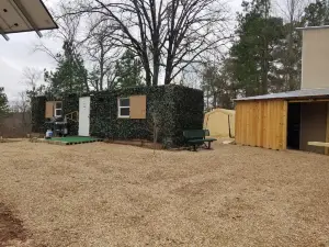Remote 64 acre forest with fishing pond, cabin, barn, greenhouse,