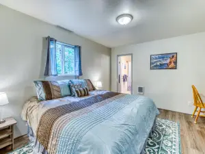 Single-level, dog-friendly home w/ private fenced-in yard & easy beach access