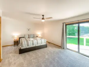 Spacious home with lake access, private hot tub, theater room & dock