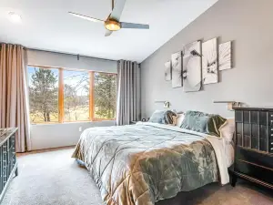 Green side smart home with golf, beach/lake access, off-site dock & EV charger