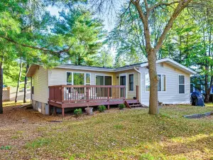 Lakefront Nekoosa Home Private Beach and Boat Dock!