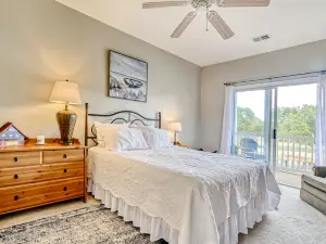 Top-floor, end-unit condo with water/golf course views, pools, tennis, & grills