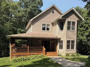 Nestled Among Majestic Trees, Hilltop Hideaway is a Woodland Sanctuary
