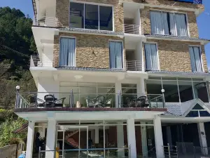 Gezellig Inn - Hotel Oasis